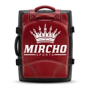 Red and black curved kick shield with handles and straps for MMA training.