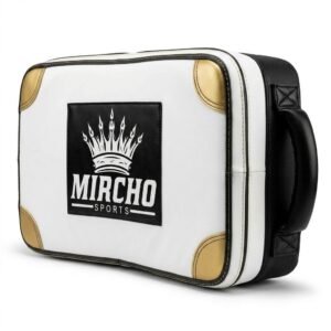 White and black sports punching pad with gold corner guards and vertical grip handles.