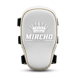 White and gold training pad with black straps and a rear handle.