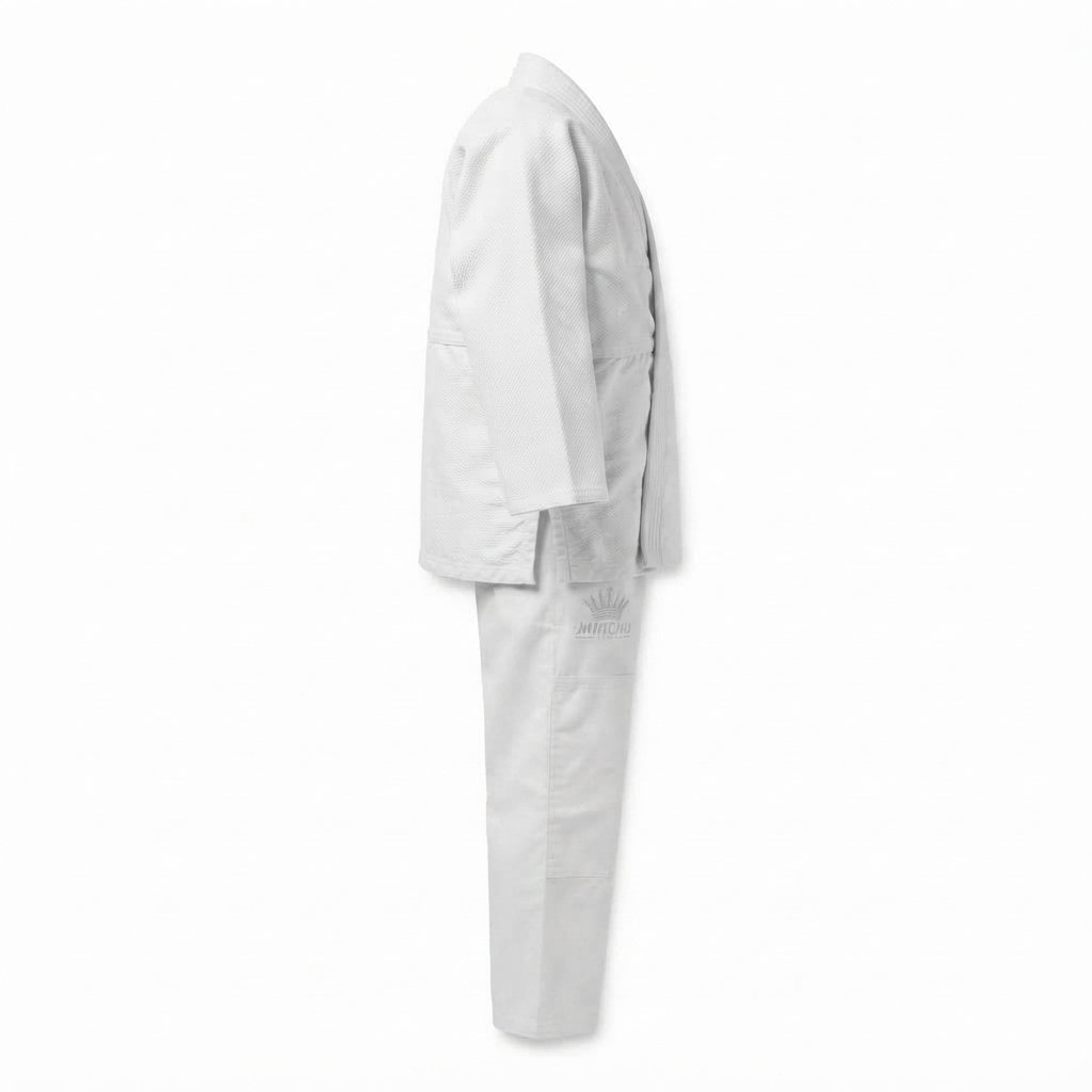 White judo uniform set laid flat against a clean background - alternate view 3