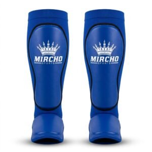 Blue protective shin guards with integrated foot coverage for martial arts training sessions.