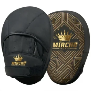 Black curved boxing focus pads featuring a gold geometric pattern and secure wrist strap.