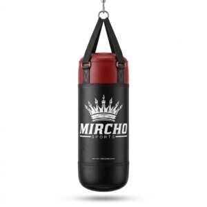 Hanging striking bag with black and red panels suspended by heavy straps for martial arts training.