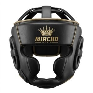 Black martial arts head guard with protective padding and gold trim viewed from the front