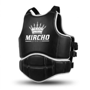 Black and white martial arts body protector featuring segmented padding and adjustable buckle straps.