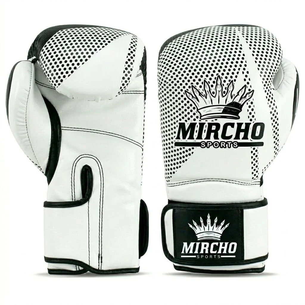 Professional white and black boxing gloves featuring a dotted pattern and wrist strap.