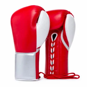A pair of red and white boxing gloves with lace-up closure displayed on a white background.